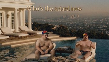 Two men in propeller beanies lounging by an infinity pool at a mansion, captioned 'Who's the retard now'