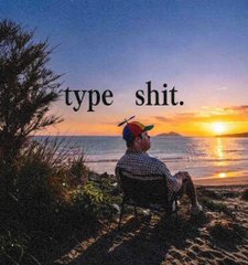 A man in a propeller beanie relaxing in a chair on a beach at sunset, captioned: type shit